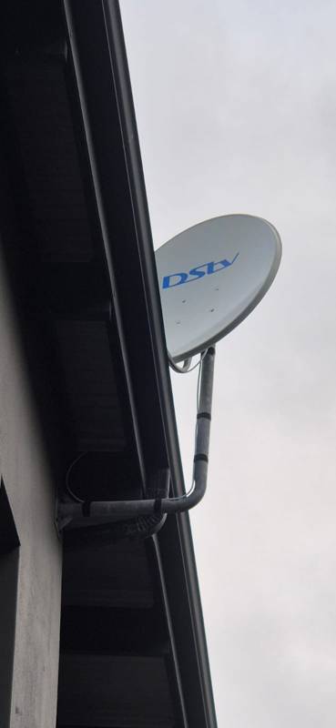 Wall-mounted DStv dish installation